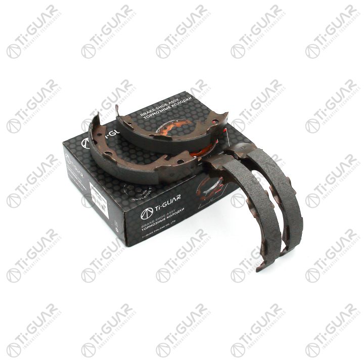 Тормозные колодки (РУЧНОГО ТОРМОЗА) TG-4299/FN0614* Ti·GUAR (комплект 4шт.)